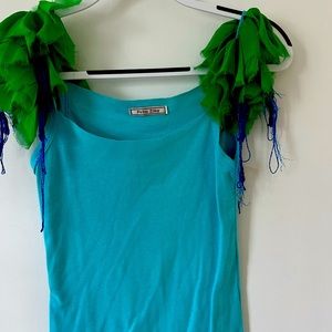 Fun top with unique shoulder embellishments